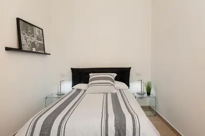 Letto o letti in una camera di Old Town Pavia