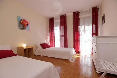 Letto o letti in una camera di De chì e de là
