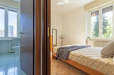 Letto o letti in una camera di Virginia Apartments