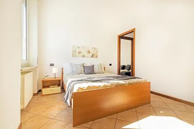 Letto o letti in una camera di Virginia Apartments