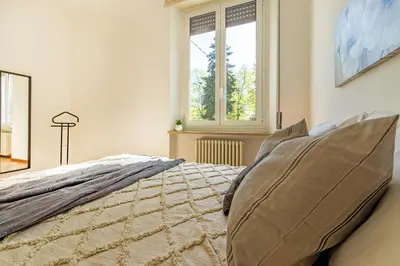 Letto o letti in una camera di Virginia Apartments