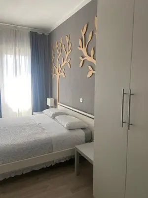 Letto o letti in una camera di Appartamento a due passi dal centro