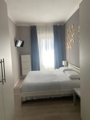 Letto o letti in una camera di Appartamento a due passi dal centro