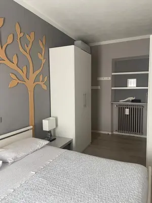 Letto o letti in una camera di Appartamento a due passi dal centro