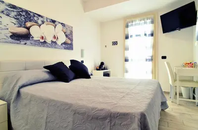 Letto o letti in una camera di B&B La casa di Graz