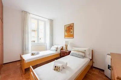 Letto o letti in una camera di WELCOME RIVIERA, Casa Luigina apartment, 90 sqm, sea view, 2 bedroom, 1 bathroom, free wifi, and, depending on availability, a private garage 800 meters away at 20,00 euro per night