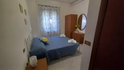 Letto o letti in una camera di La valle fiorita