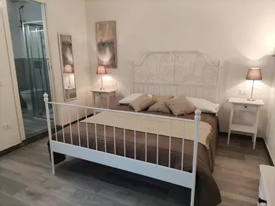 Letto o letti in una camera di Affittacamere Ca der Culunellu