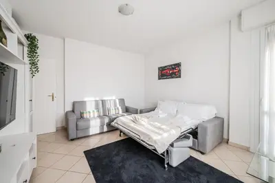 Letto o letti in una camera di Formigine - [Motor Valley-Homes]