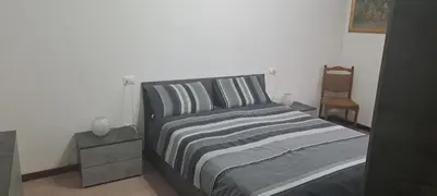 Letto o letti in una camera di CASA DELLA NONNA