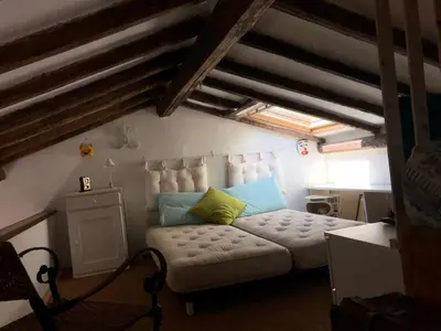 Letto o letti in una camera di Casa Madeleine