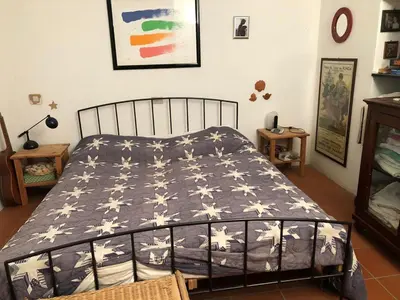 Letto o letti in una camera di Casa Madeleine