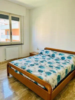 Letto o letti in una camera di Casa Bixio