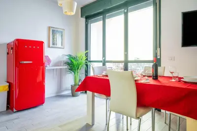 Cucina o angolo cottura di GuestHost - Parma Residential Flat with balconyParma Residential Apartment con balcone