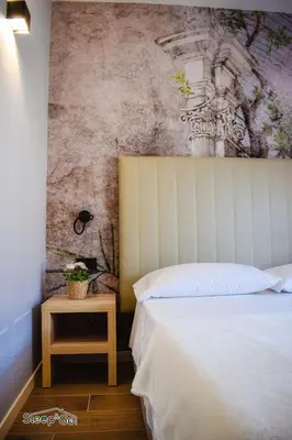 Letto o letti in una camera di GuerriniBNB Civico 5