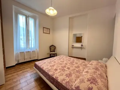 Letto o letti in una camera di Casa Eleonora