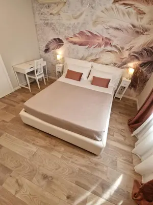Letto o letti in una camera di FLORA HOUSE