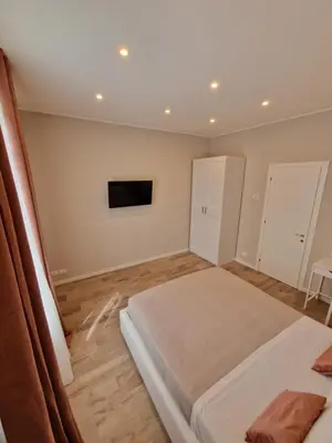 Letto o letti in una camera di FLORA HOUSE