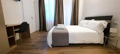 Letto o letti in una camera di R & A Minerva Suites