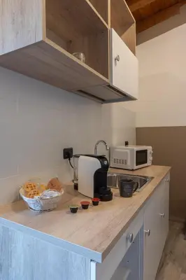 Cucina o angolo cottura di Angolo Nascosto Apartments