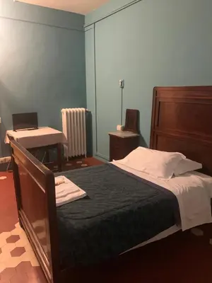 Letto o letti in una camera di Leon doro