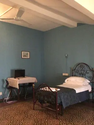 Letto o letti in una camera di Leon doro