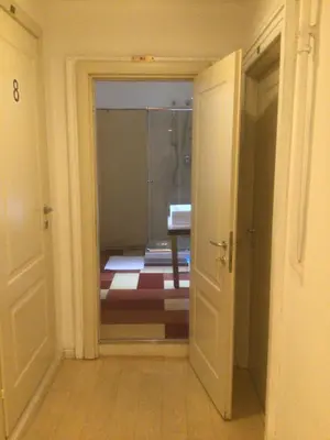 Letto o letti in una camera di Leon doro
