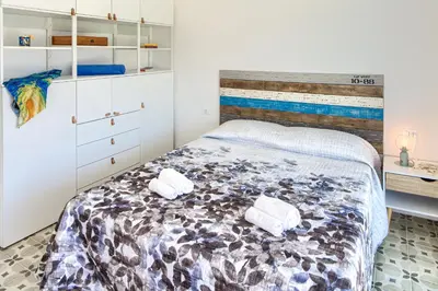 Letto o letti in una camera di Casa GRANDE MARE
