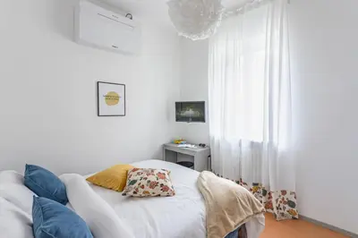 Letto o letti in una camera di Casa Fiordaliso - Pavia City - by Host4U